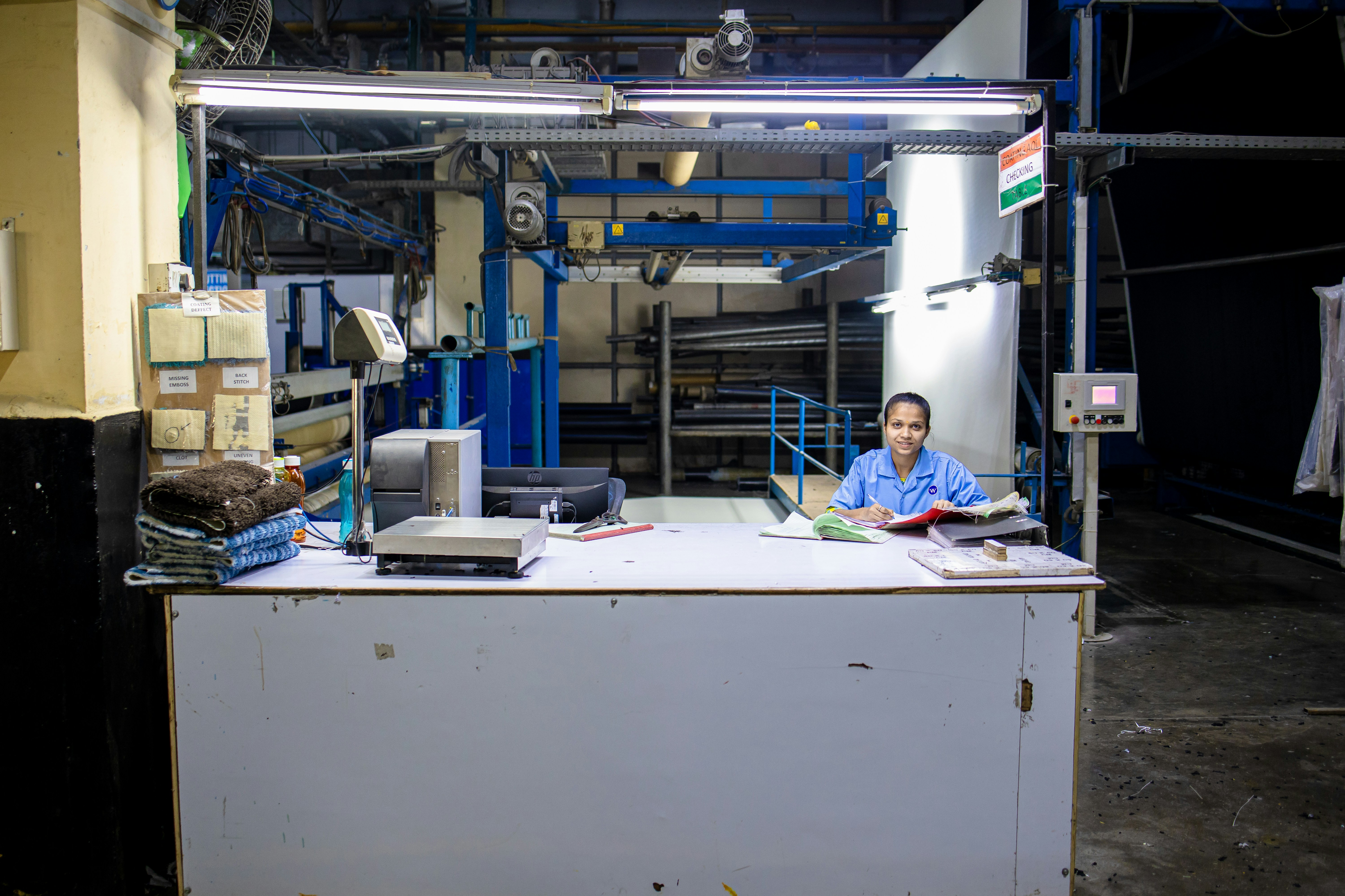 Engineers reviewing product improvements in factory